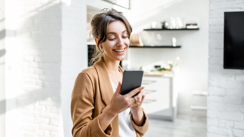 Contact - woman with mobile phone